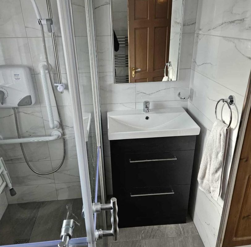 Newly installed level access shower & toilet aids in Bray, North Wicklow