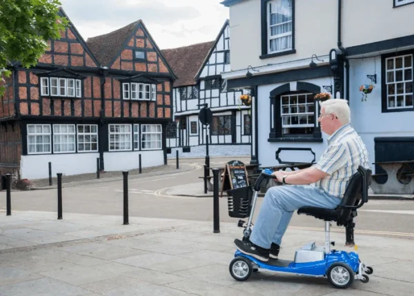 Illusion-Blue-Lifestyle-Street-700x500-tpng.webp Illusion Mobility Scooter Lightweight Mobility Scooters Dublin