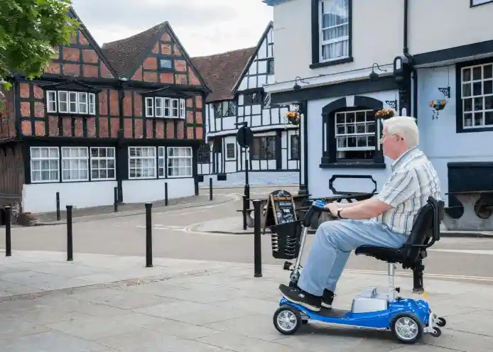 a man on lightweight mobility scooter