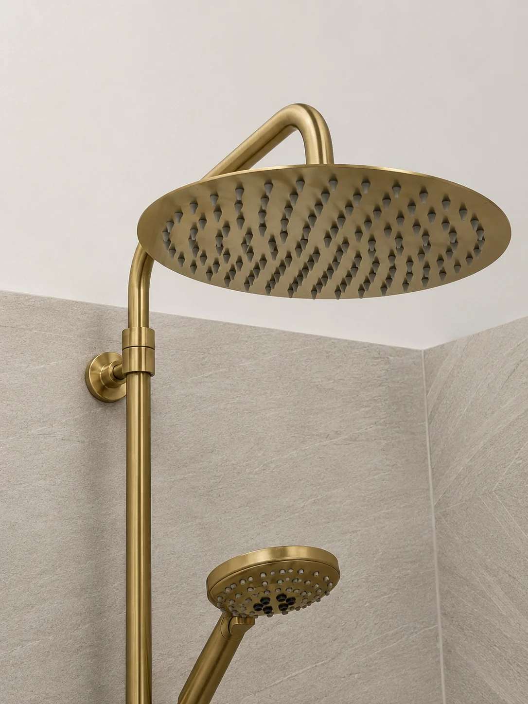 Brushed gold rainfall shower head with matching hand shower