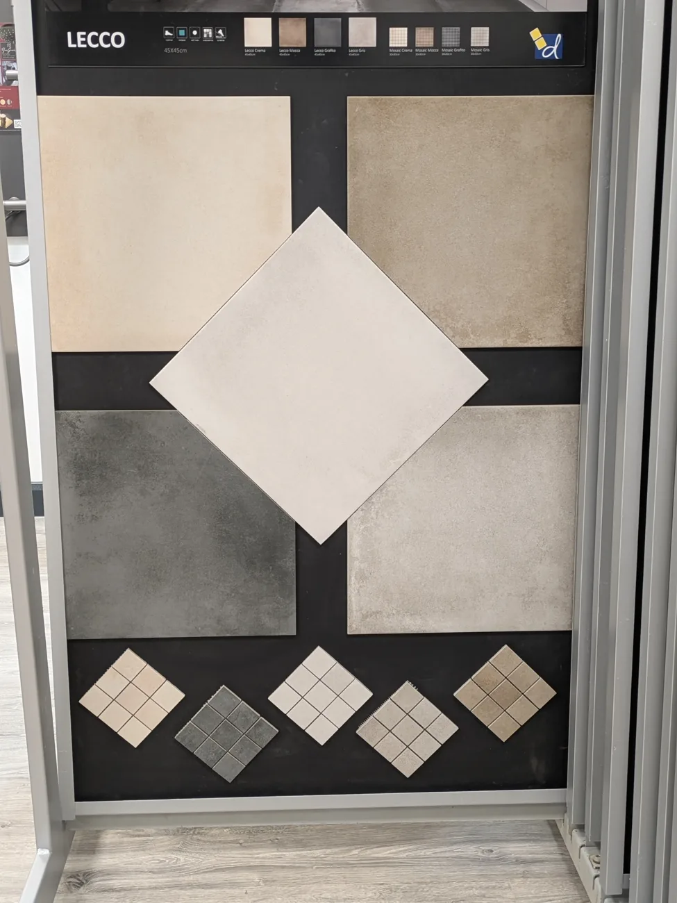 Porcelain tile display in cream, mocca, grafito and gris finishes at the Clane showroom