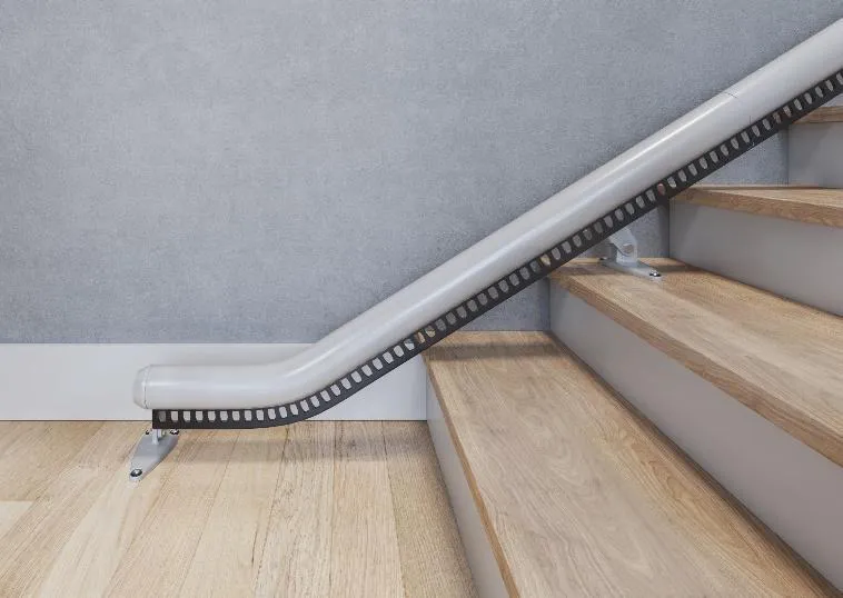 Flow X rail extending flat along the floor past the bottom step